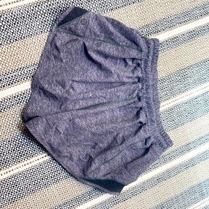 Lululemon “hotty-hot” style, size four (2.5 inch) shorts. Very good condition.